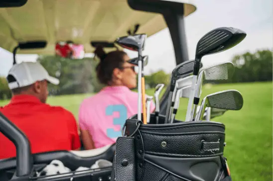 golf cart and golf clubs in the bag