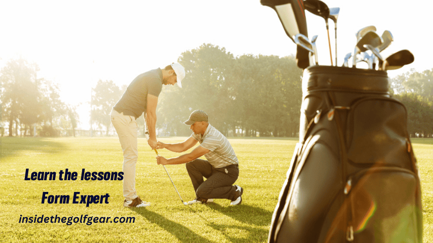 Personal trainer giving a lesson to a young male golfer